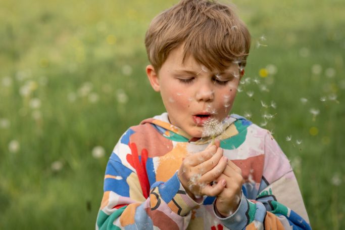 Kind mit Seifenblasen